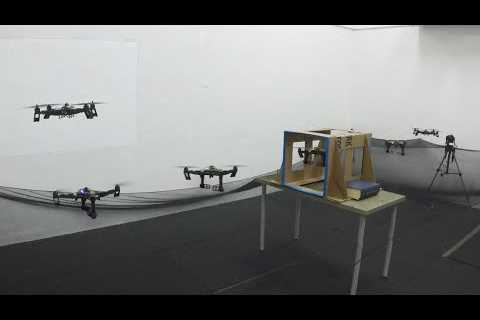 Design and Control of a Midair-Reconfigurable Quadcopter using Unactuated Hinges